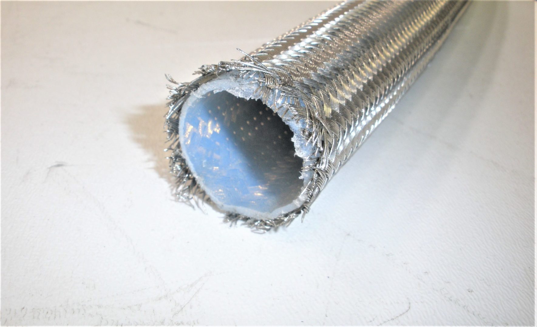 mickel-dhanoolal-stainless-steel-braided-hose-ft-in-alskdfjslkdfjaslkfjsldkfjasdlkfjslkfdjsdioweuriowurwer-1-4-scaled