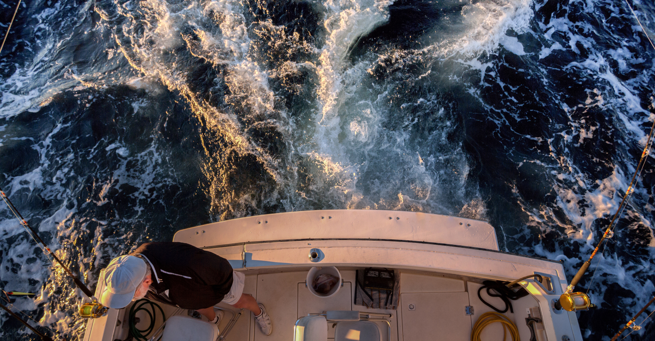 man fishing on a boat