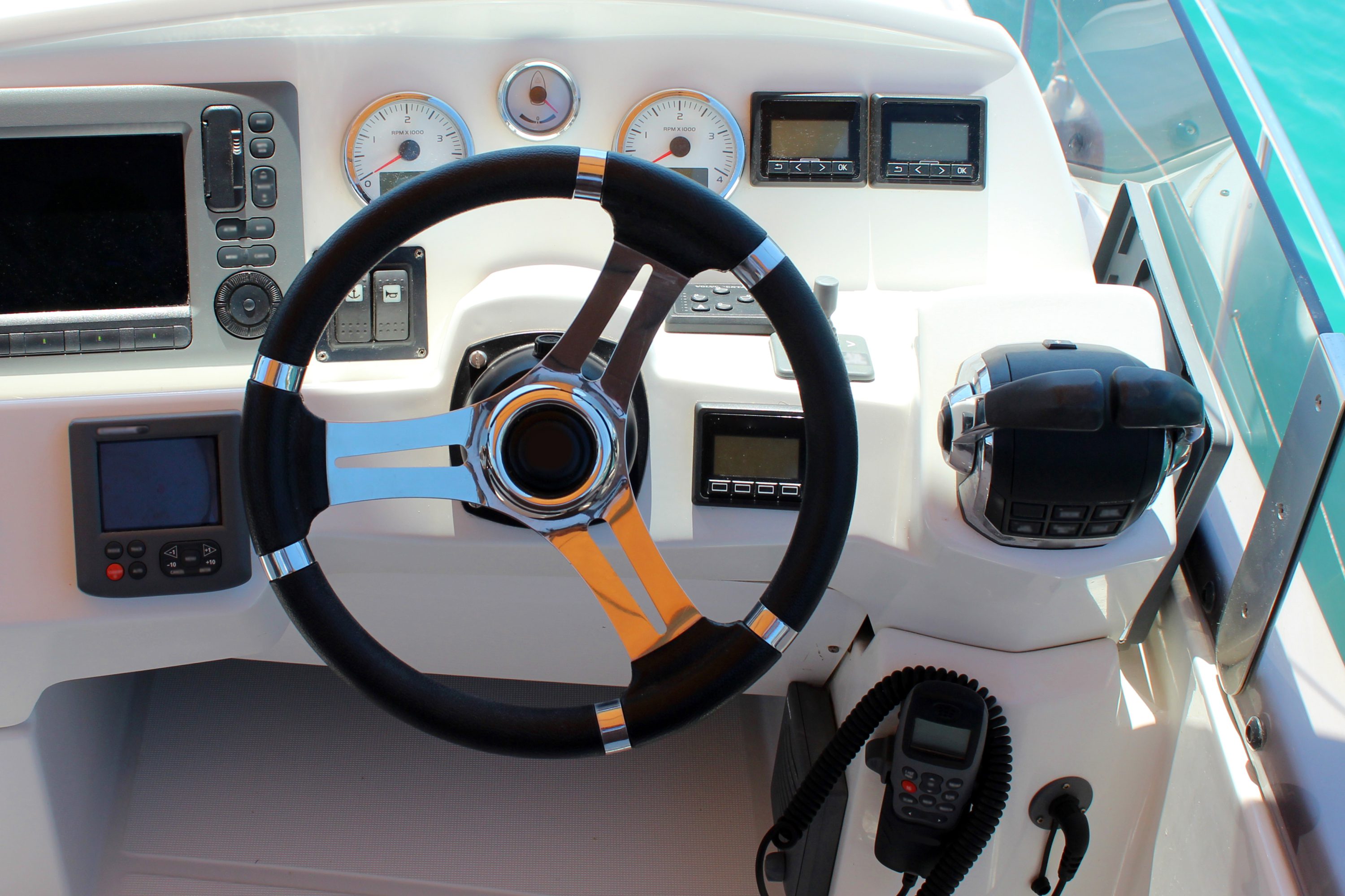control panel and helm on motor yacht